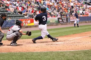 What runs around a baseball field but stays still at the same time image