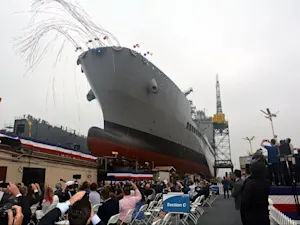USNS Harvey Milk (T-AO 206) slides into the water during the christening ceremony at General Dynamic NASSCO, San Diego