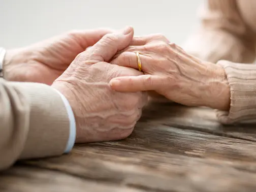Older Couple Holding Hands