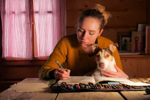 Which type of dog is great at drawing? image