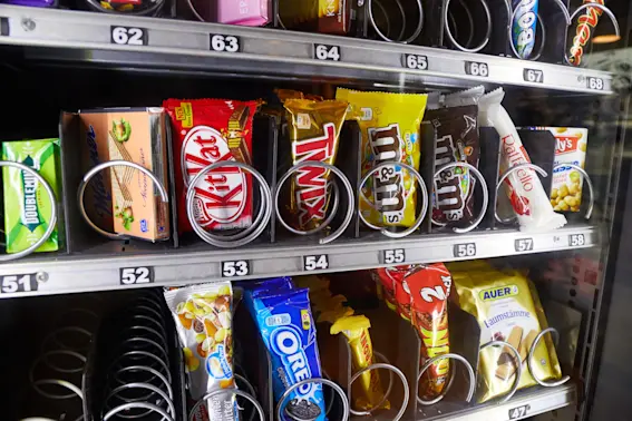 The Surprising Side Hustle of NCAA Star D.J. Burns: Vending Machines!-1