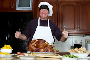 On Thanksgiving, what does Dad have in common with an exhausted baseball player? image