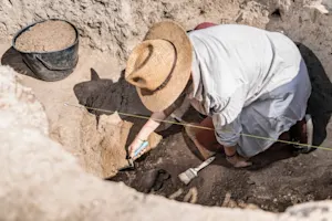 Why was the archaeologist out of a job? image
