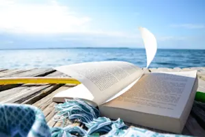 Where do books love to go on vacation? image