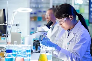 Where does a scientist wizard work? image