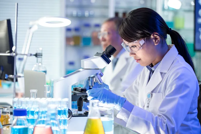 Where does a scientist wizard work? image
