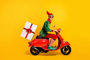 How do elves travel around the North Pole? image