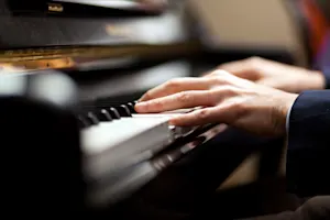 Why did the pianist put his head on the piano? image
