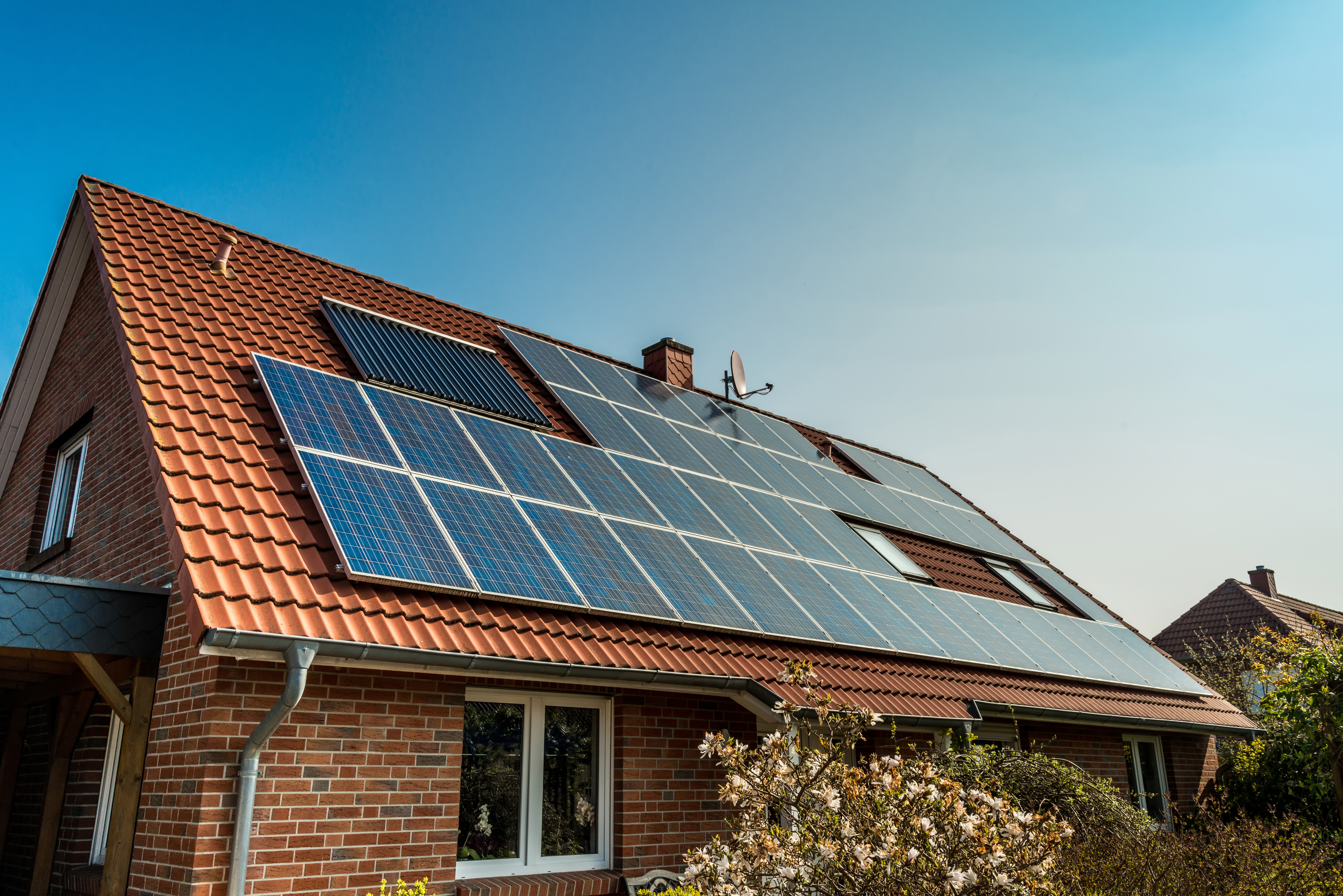 Why did the inventor install solar panels all over his house? image