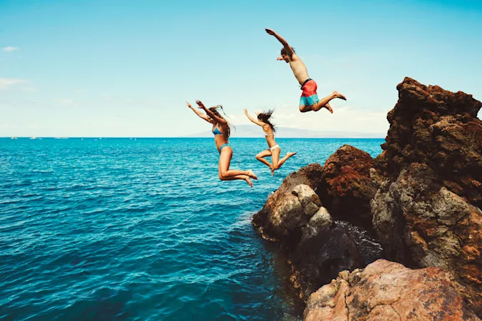 Why did the teacher jump into the ocean? image