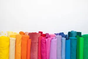 Why was the fabric always laughing? image