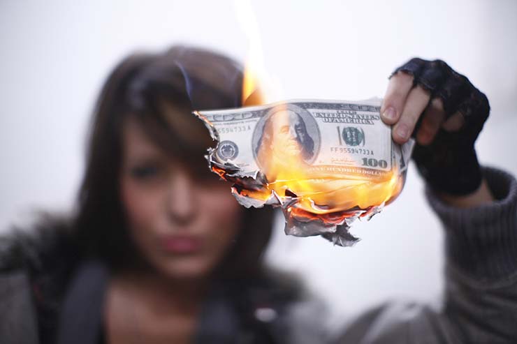  What do you call a woman who sets fire to all her bills? image