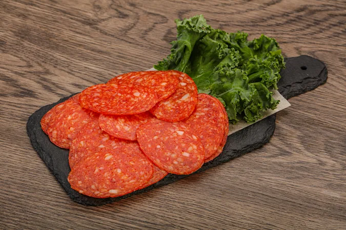 Where does the pepperoni go on vacation? image