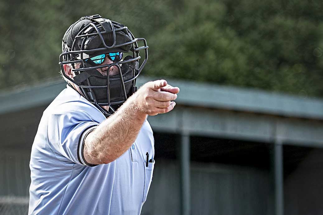  What's the difference between a pickpocket and an umpire? image