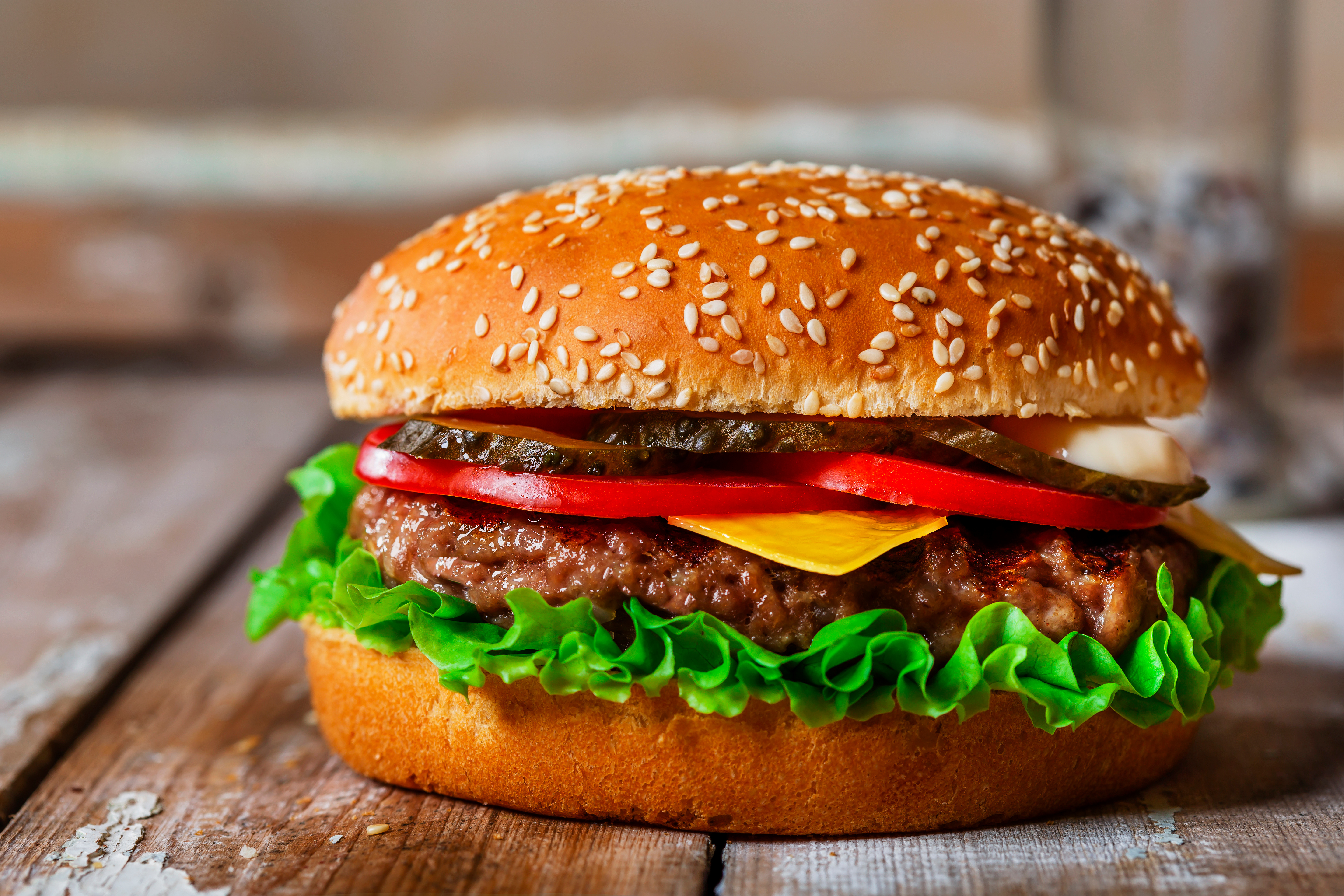 How do you make a hamburger laugh? image