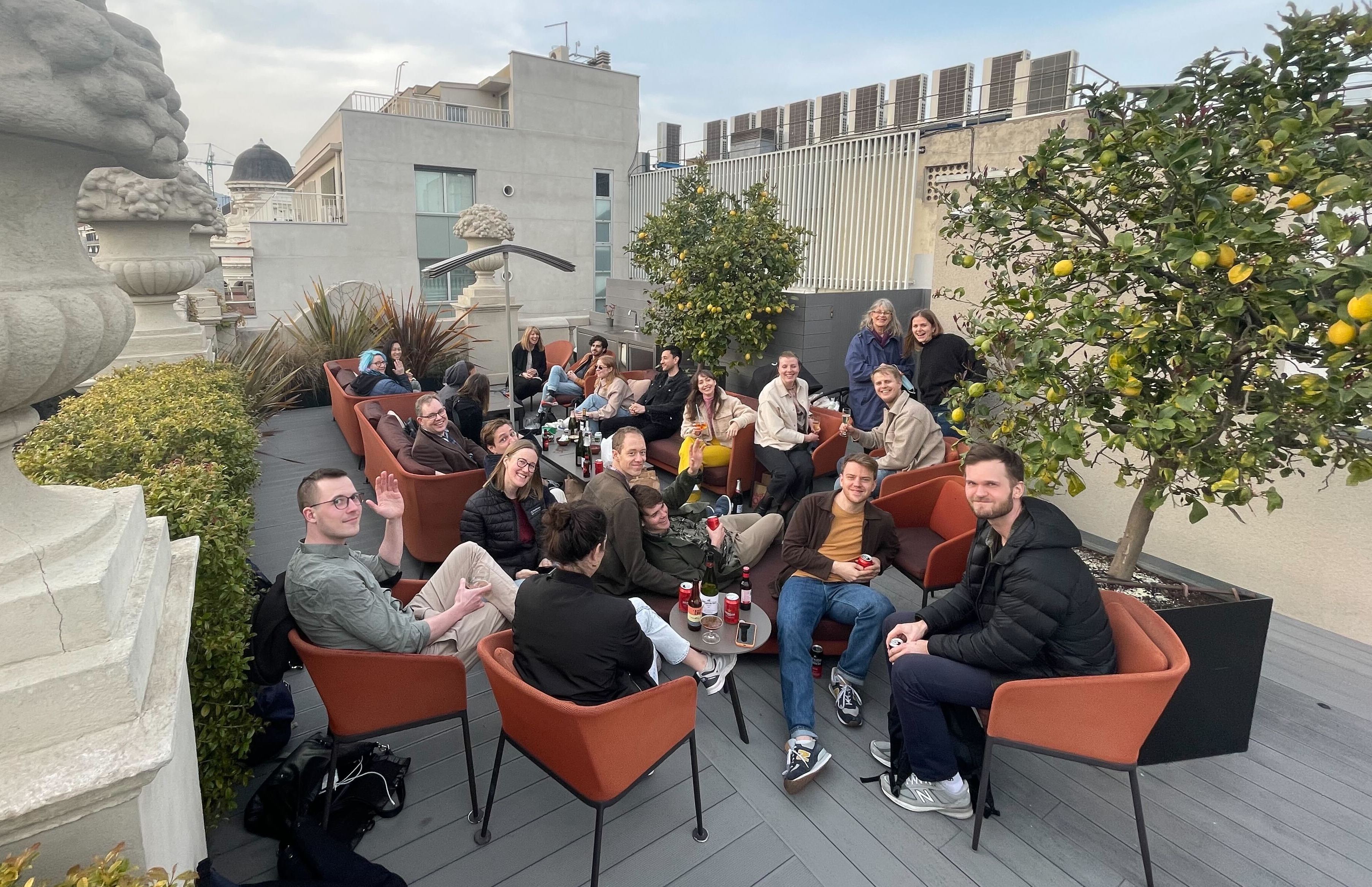 The team relaxing on a roof terrace.