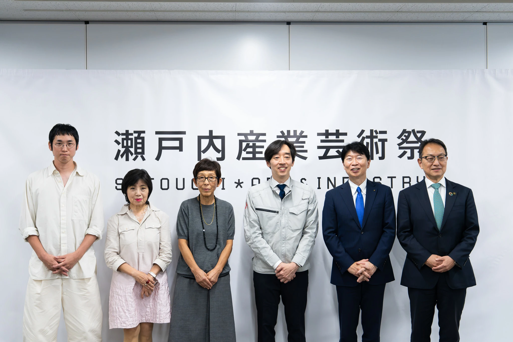 The opening ceremony held at Tamano City Hall on Friday, October 2. From left: Masaki Satake, Creative Director; Yuko Hasegawa, Curator; Kazuyo Sejima, Architect; Masahiro Ito, Representative Director, Japan Industrial Art Foundation (President and CEO, PowerX); Ryuta Ibaragi, Governor of Okayama Prefecture; and Yoshiro Shibata, Mayor of Tamano City.
