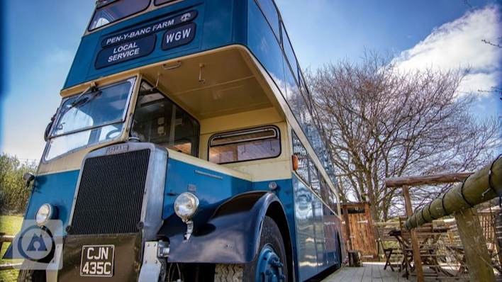 Ceridwen Centre's converted double decker bus. Image owned by https://ceridwencentre.co.uk/.