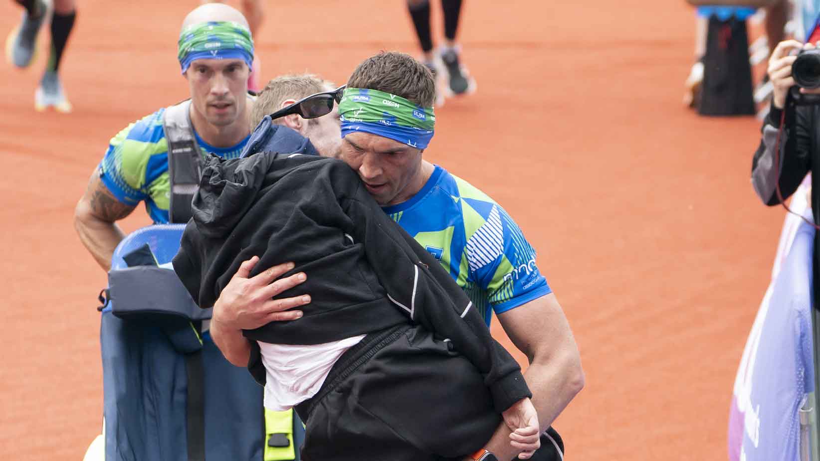 Emotional Kevin Sinfield carries Rob Burrow over finish line at Leeds ...