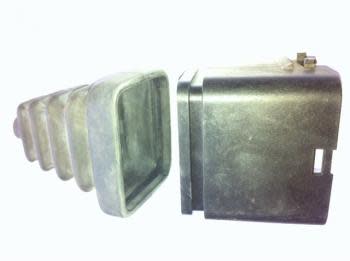 Rubber boot and housing