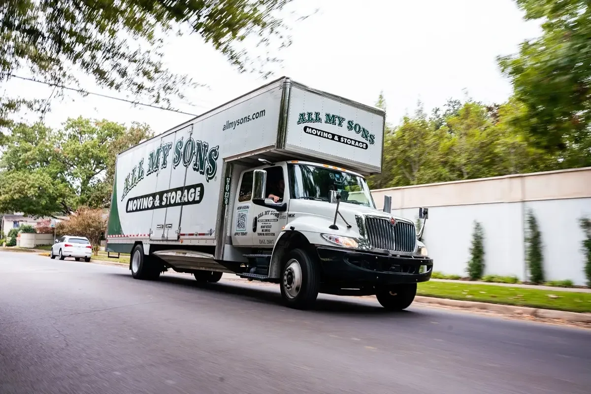 All My Sons moving truck zooms on the road making a last-minute move.
