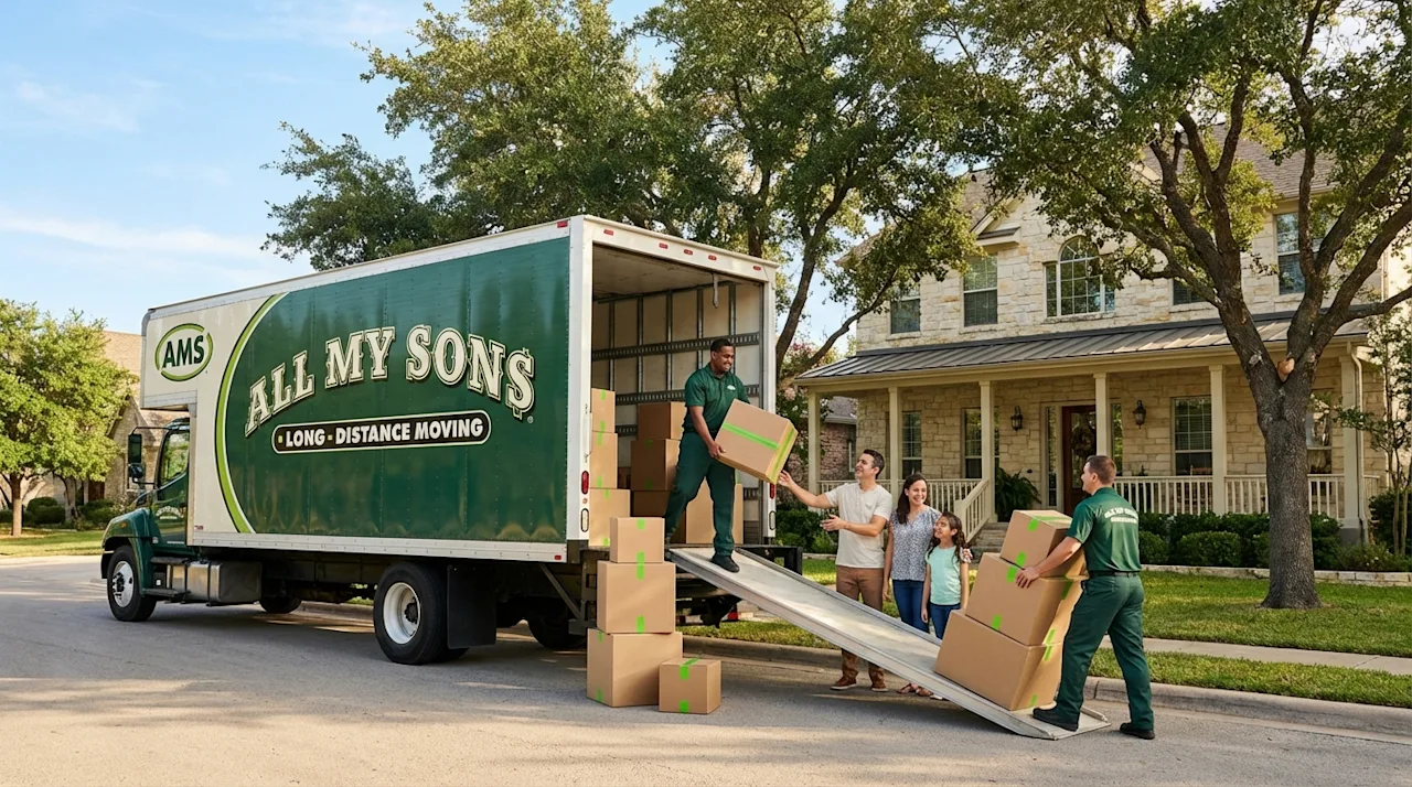 All My Sons movers and family unloading a green moving truck at a limestone home in Round Rock, Texas.