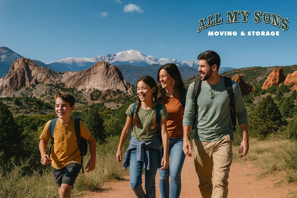 A happy family hiking in Colorado Springs with Pikes Peak in the background, embodying new beginnings. All My Sons: Your trusted local movers.