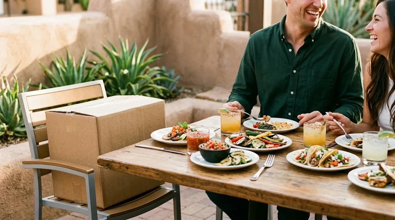 High-quality, candid lifestyle photography of a warm, sunlit patio at a highly-rated restaurant in Tucson. The scene centers