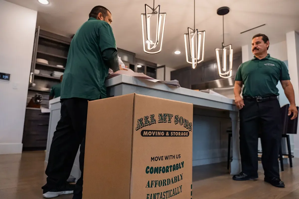 All My Sons professional packers prepare kitchen items for moving.