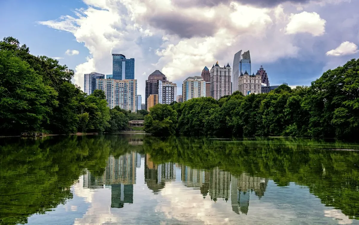 The Atlanta skyline from Piedmont Park, image taken by Terry Granger on Unsplash. 