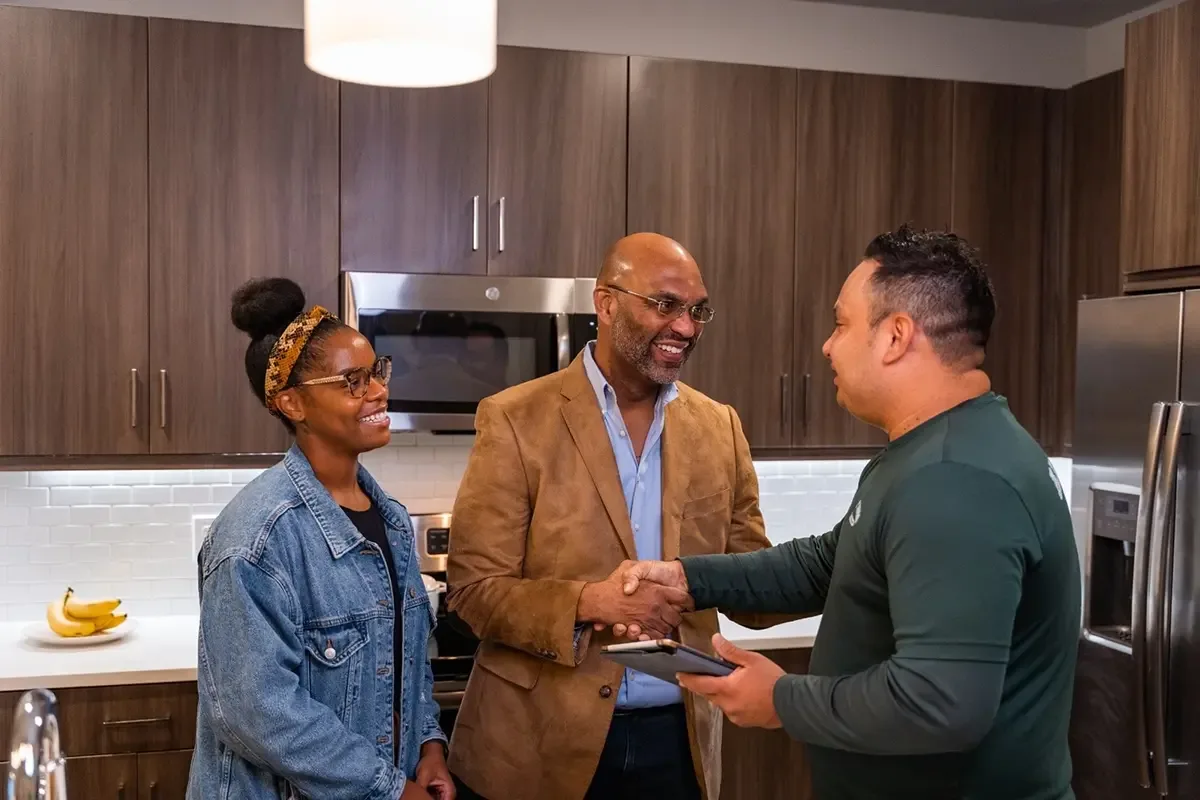 All My Sons mover shakes hands with customer right before they start the move.