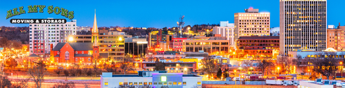 buildings in littleton, colorado lit up at night