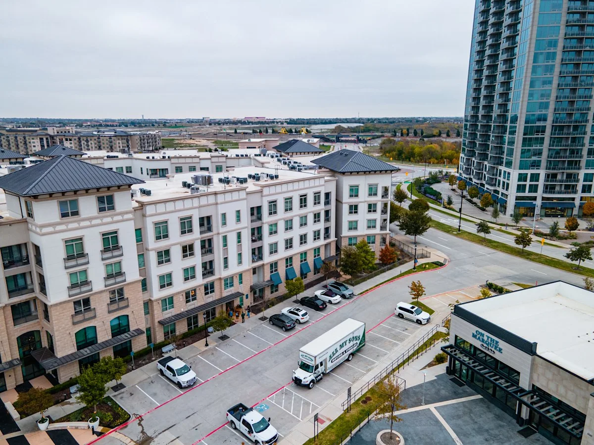 All My Sons Moving and Storage truck arrives to help an apartment move.