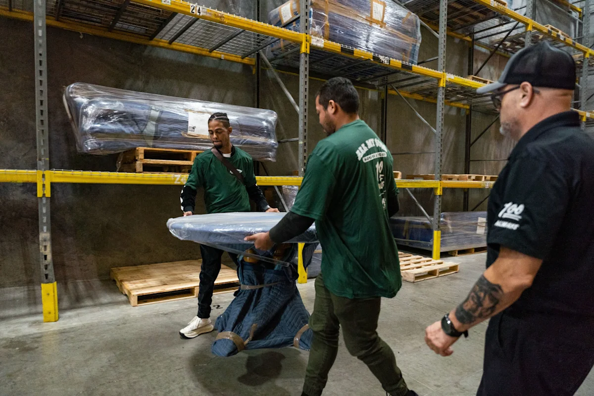 All My Sons professional movers prepare to organize a full-service storage unit.