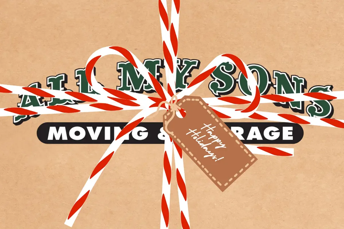 A festive holiday package featuring the All My Sons Moving and Storage Logo with a tag that says Happy Holidays.