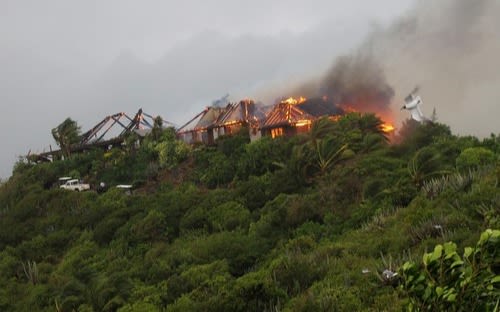 View from a distance of a building on fire