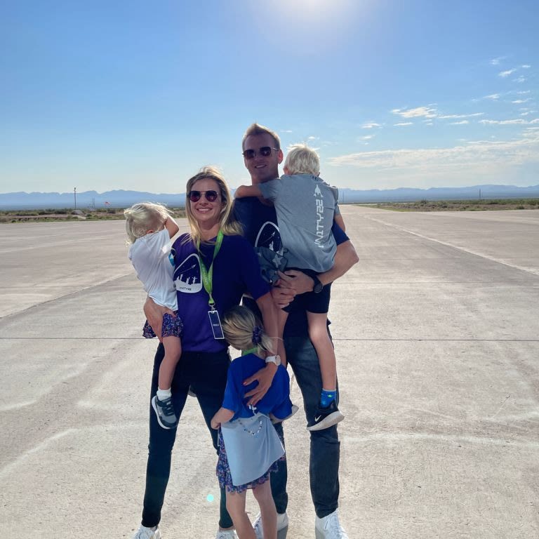 Holly Branson standing with her husband and three children at Spaceport America ahead of Richard Branson's spaceflight with Virgin Galactic