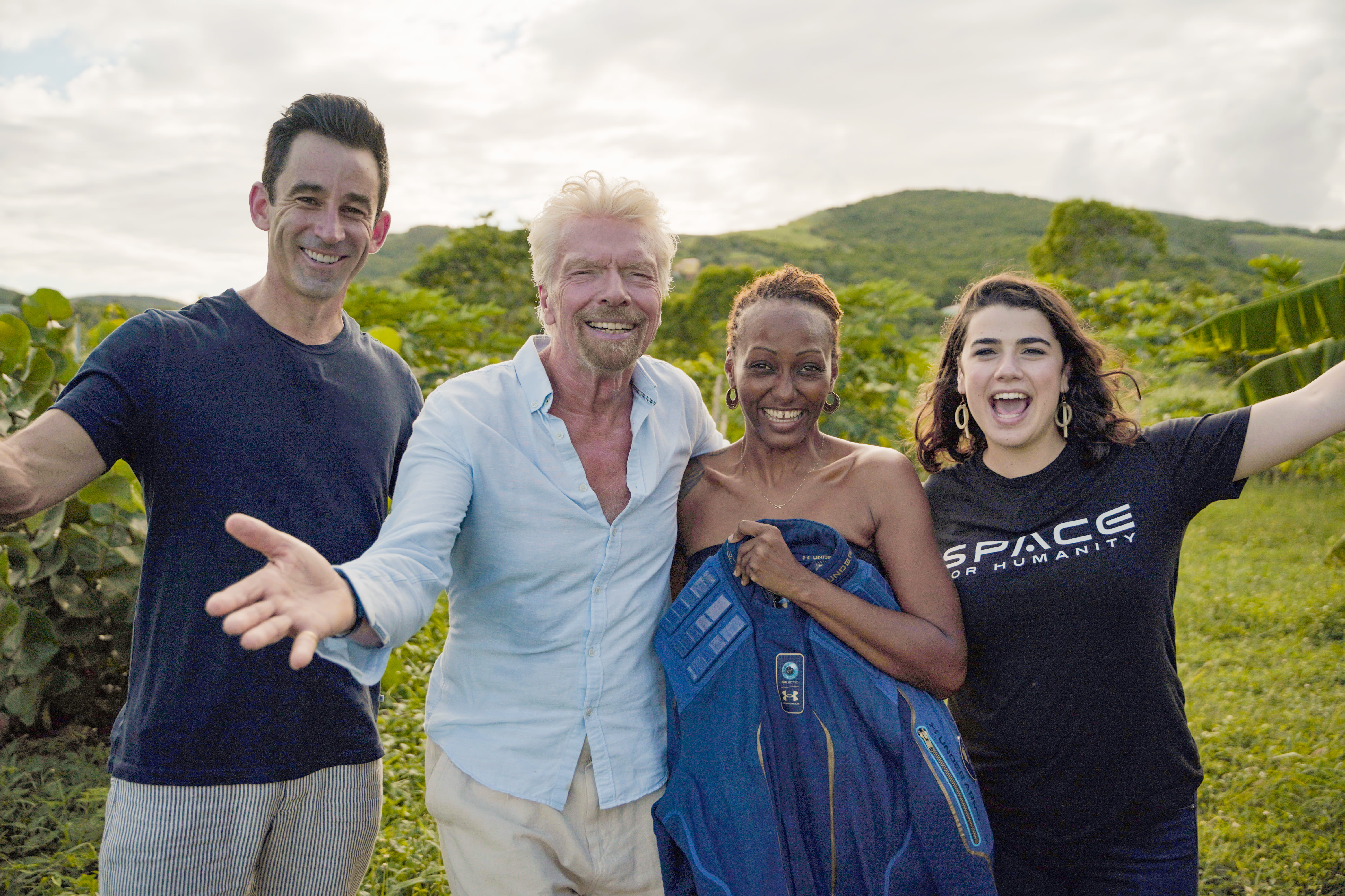 Richard Branson with Virgin Galactic and Omaze competition winner Keisha Schahaff