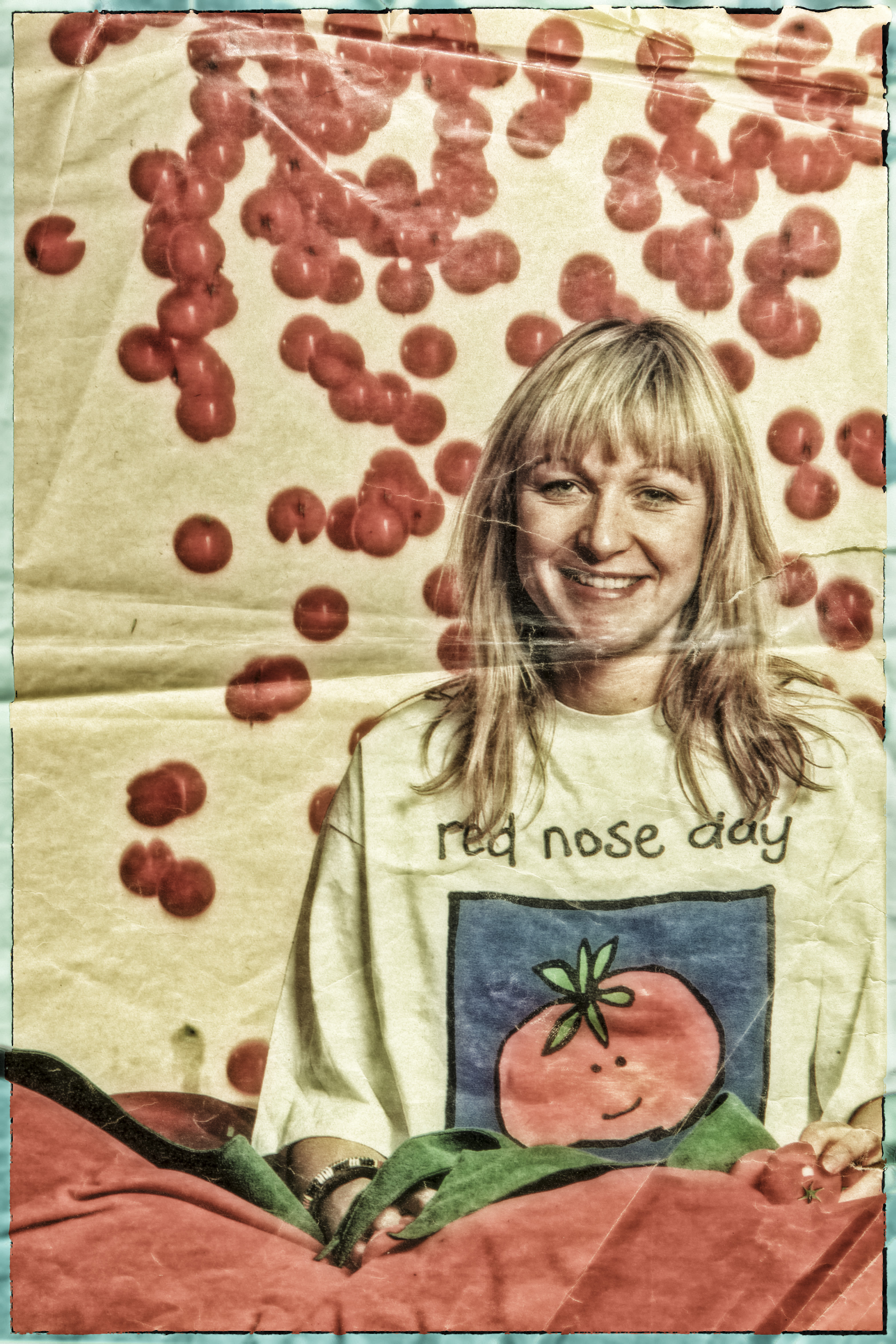 An odl photo of Jane Tewson wearing a Red Nose Day t-shirt