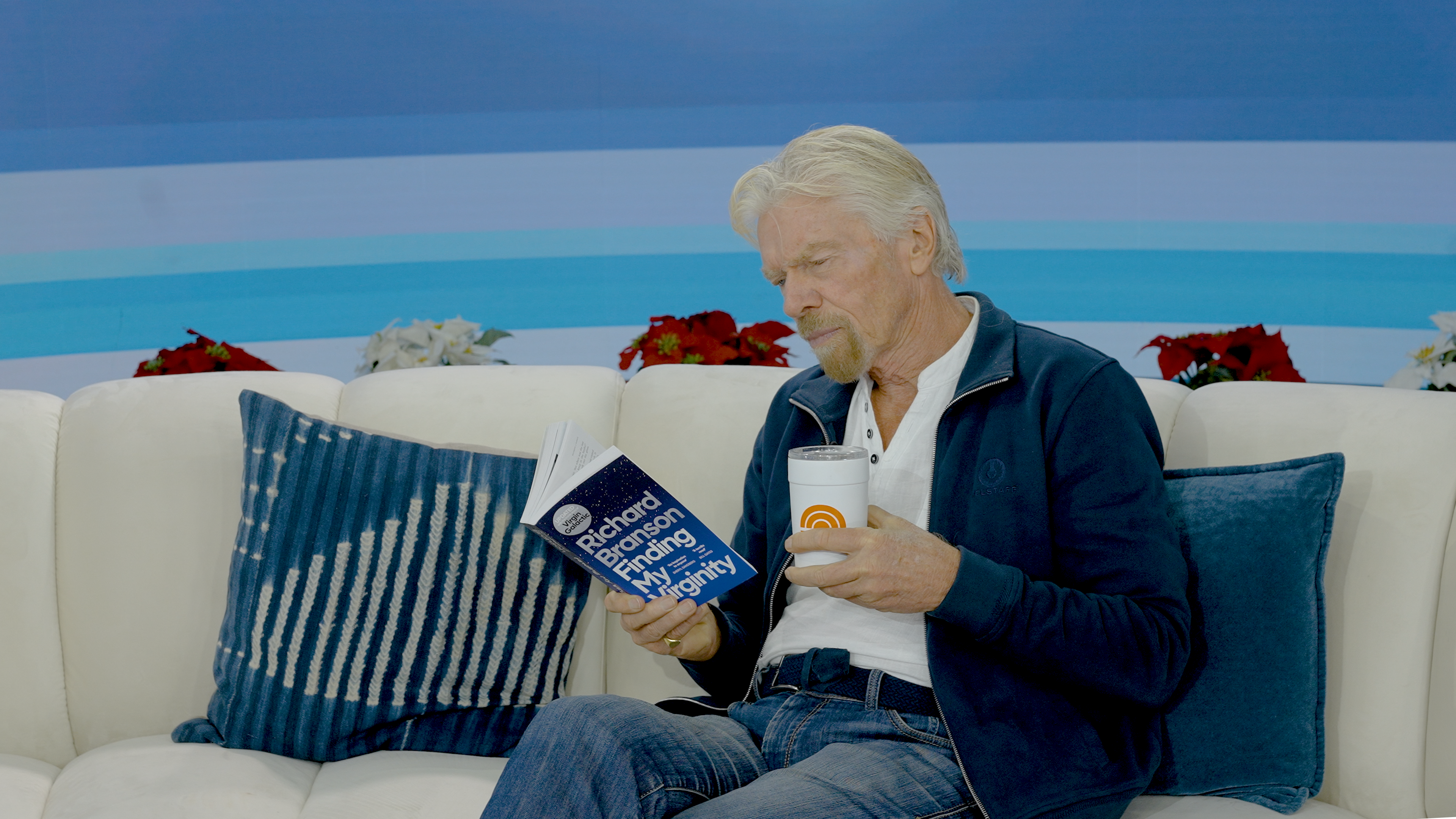 Richard Branson on CNN This Morning Live, reading Finding My Virginity