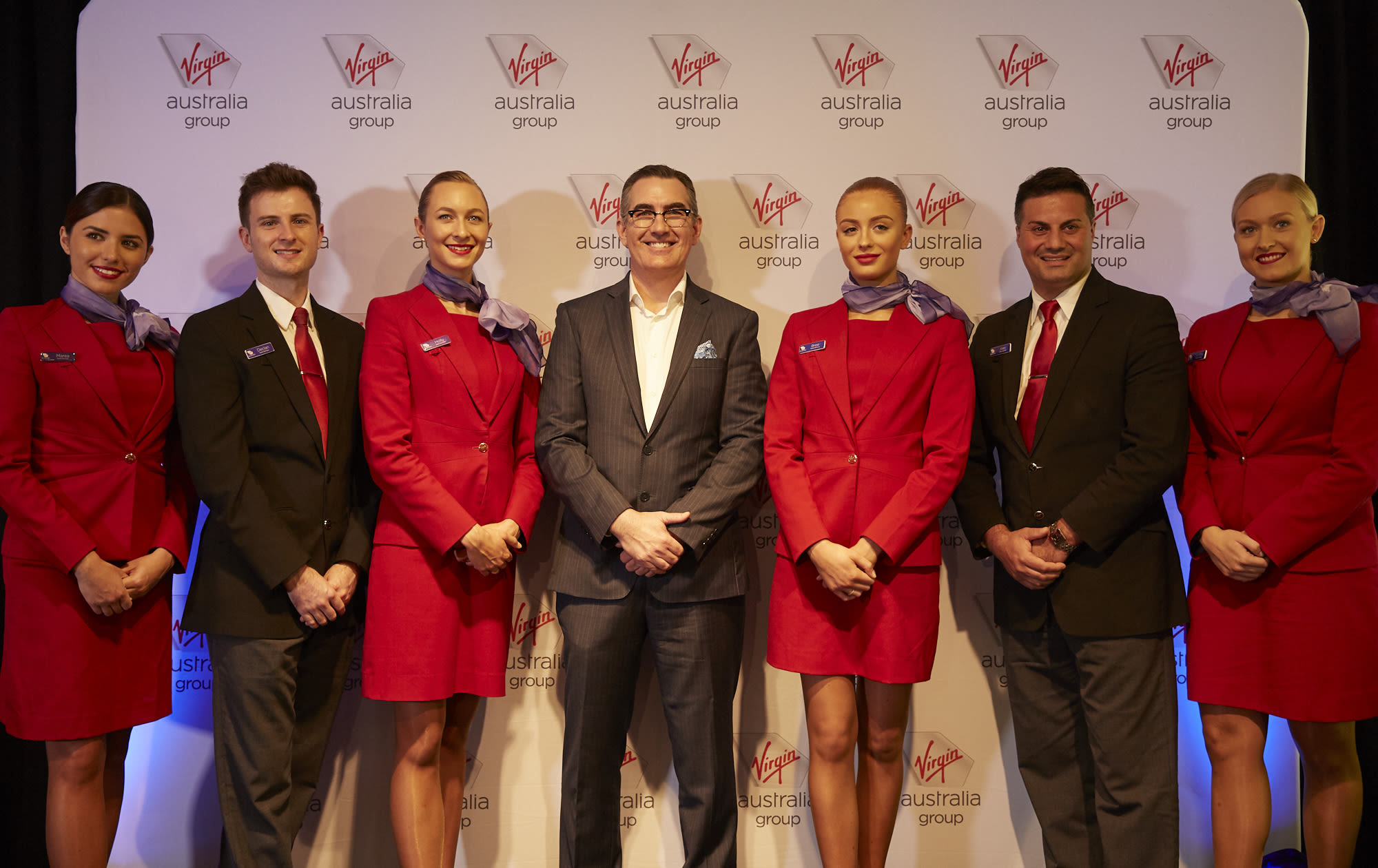Paul Scurrah with Virgin Australia cabin crew members