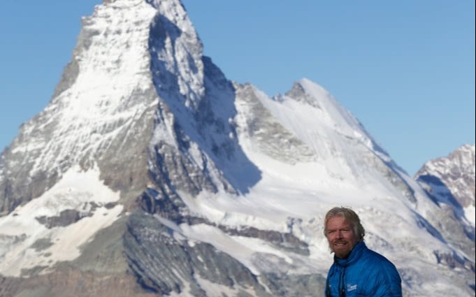 Richard Branson looking at the camera with the Matterhorn in the background