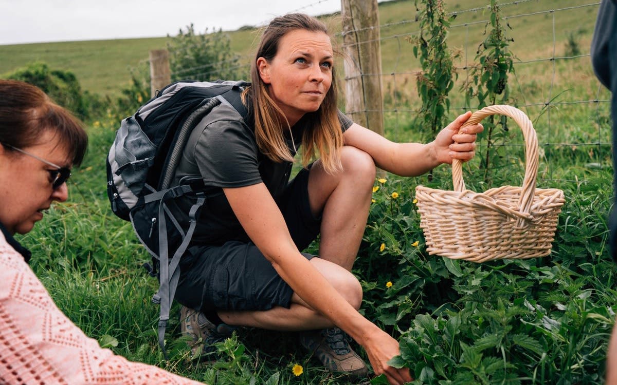 Image of a lady foraging.