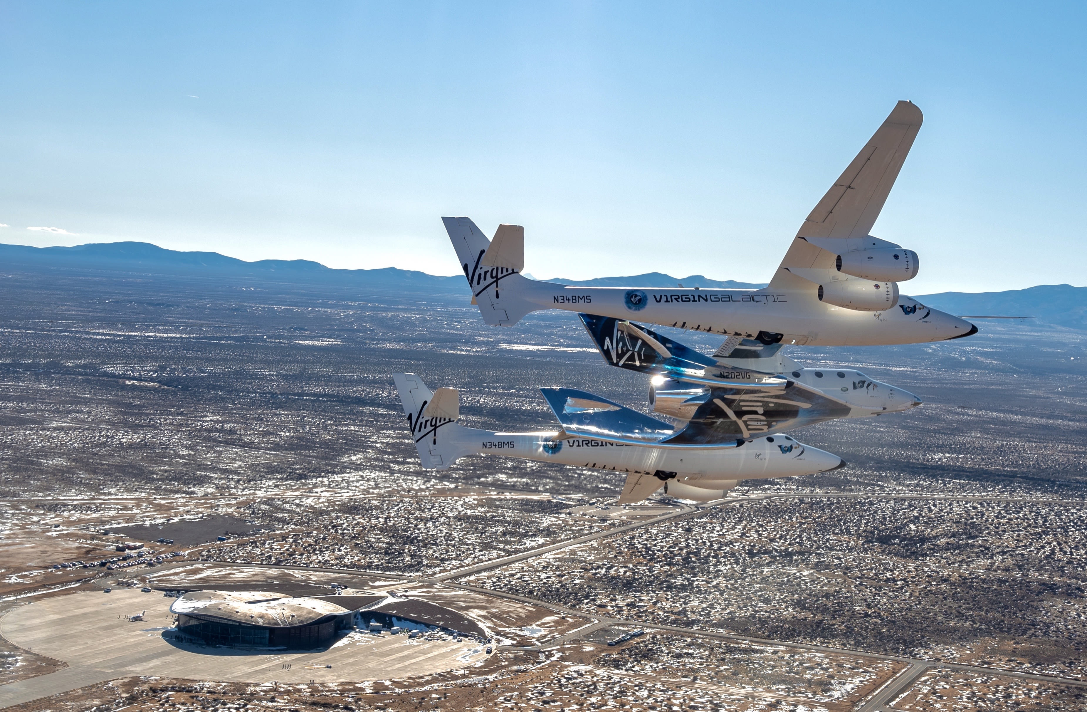 VMS Eve and VSS Unity fly into Spaceport America in New Mexico