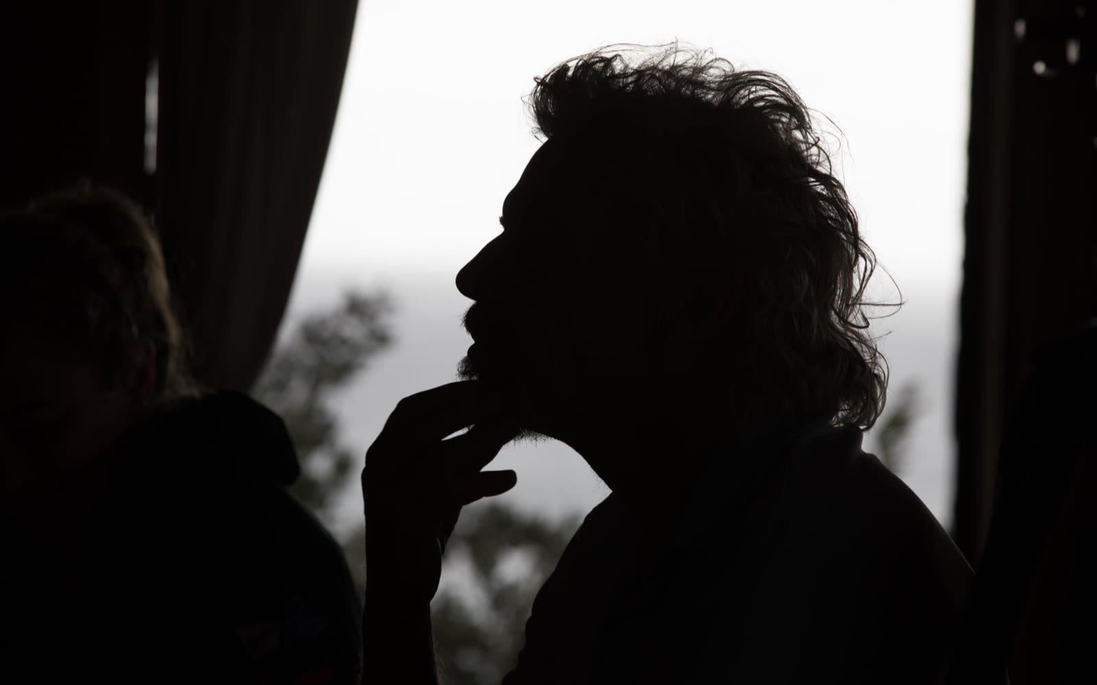 Silhouette of Richard Branson in a pensive state