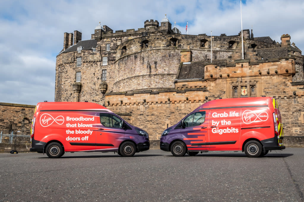 Two Virgin Media vans parked outside Edinburgh Castle