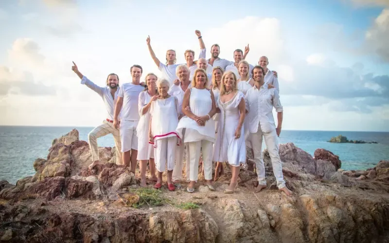 The extended Branson family posing for a photo on Necker Island all wearing white