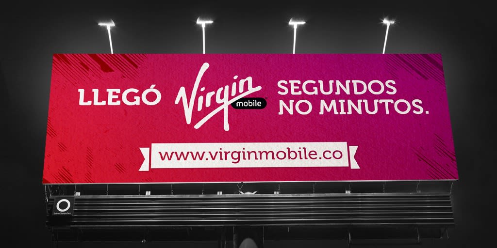 A billboard with the text "Llego Virgin Mobile segundos no minutos"