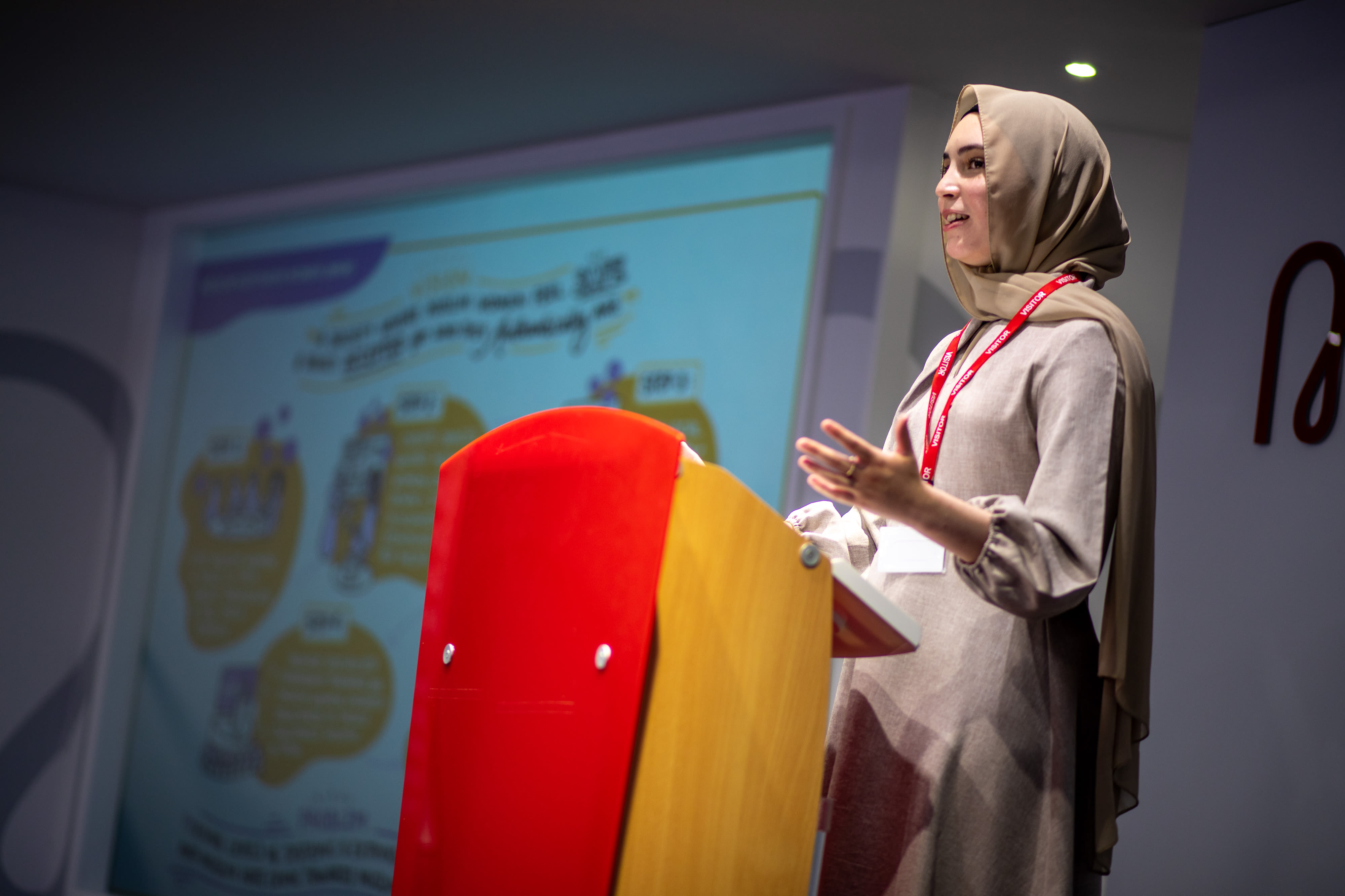 Roukagia speaking at an event with the Virgin Money Foundation