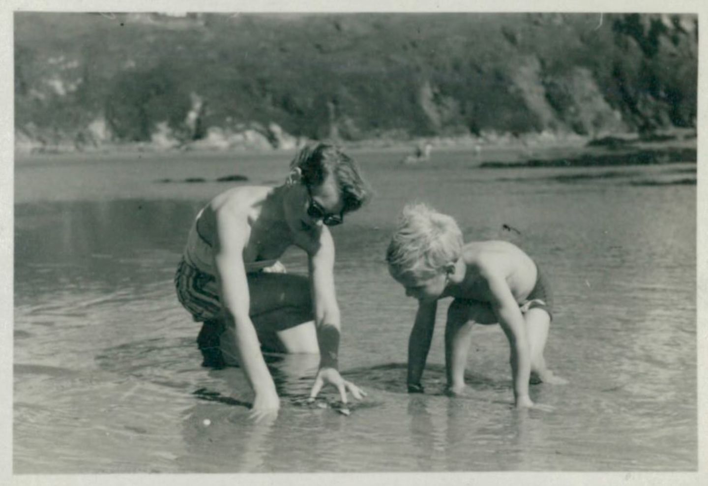 Archive photo of Richard Branson playing on the beach as a child 